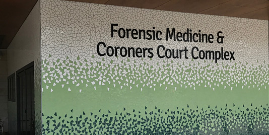 Entry sign design for a workplace including medical facilities and courtrooms by Minale Tattersfield Sydney Australia